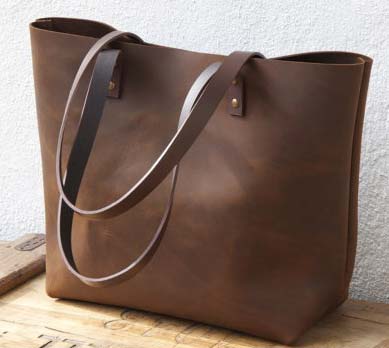 Pure leather bags online for women